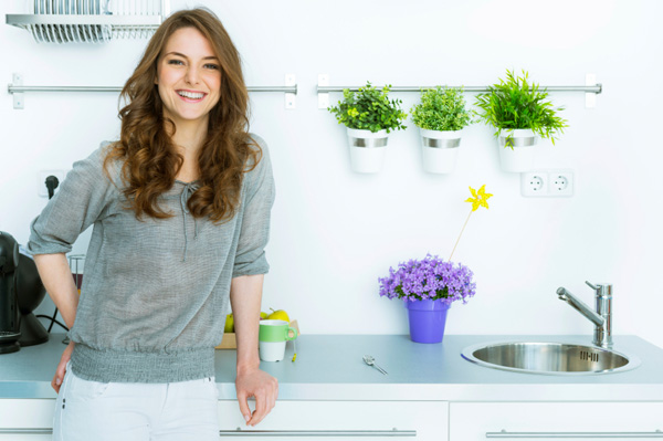 Woman in modern kitchen