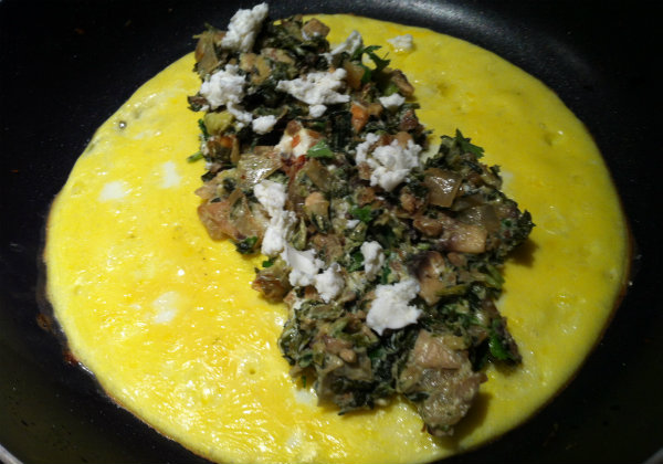 Add veggies to eggs