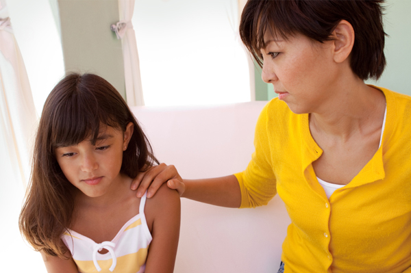 Mom talking to daughter