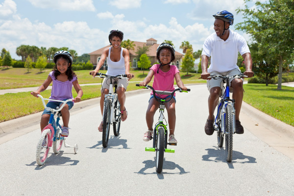 Family riding bikes