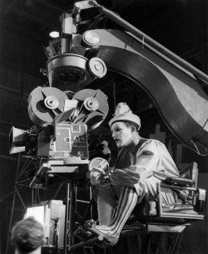  Gene Kelly in costume behind the camera directing the 