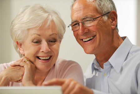 Grandparents looking at photos online