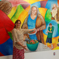 Woman presenting mural