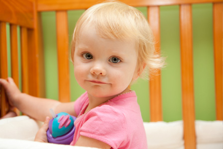 Toddler in crib