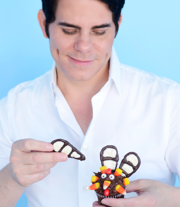 Assembling the turkey-inspired chocolate cupcake