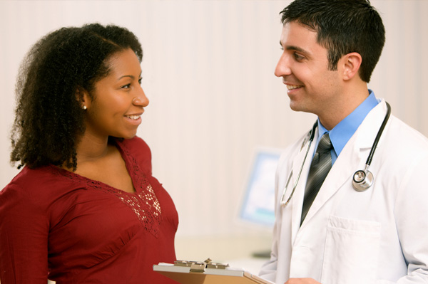 woman visiting doctor for pain