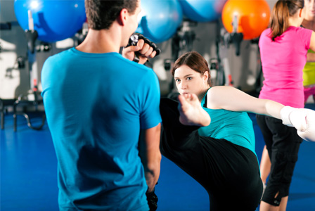 Woman in kickboxing class