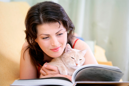 woman lounging and reading