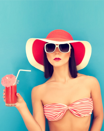 Woman drinking watermelon cocktail