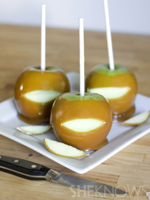 Cut out the mouth | Vampire Caramel Apples