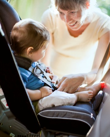 baby rearfacing in carseat, properly adjusted buckles