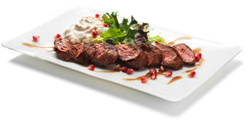 Spice Rubbed Lamb Tenderloin Loin with Pomegranate Mint Yogurt Sauce and Toasted Almonds