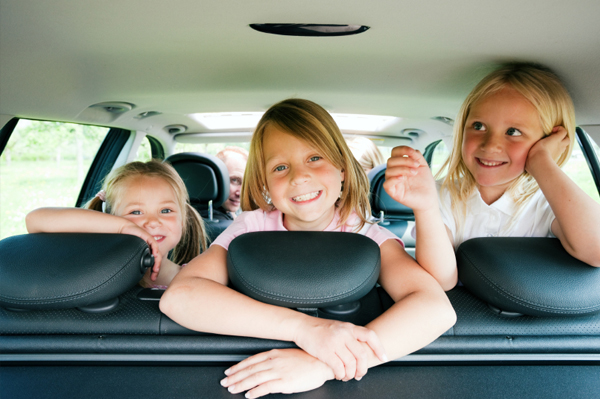 car with three girls