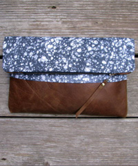 Driftwood and fossil leather clutch