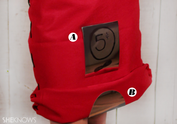 Finishing touches on the gumball machine Halloween costume