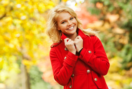 Happy woman in fall