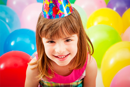 Little girl at birthday party