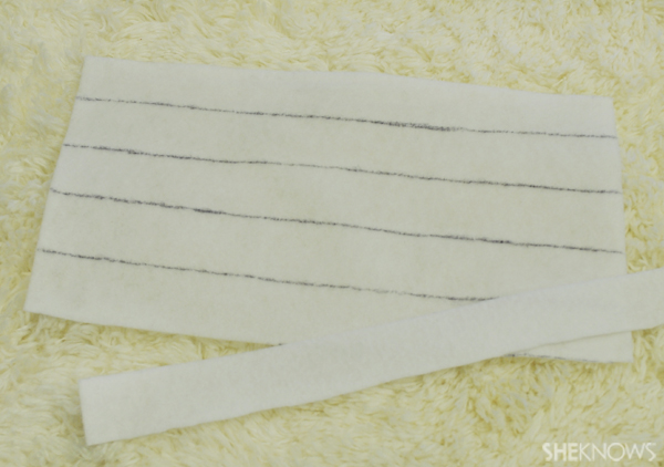Cut the white felt into strips for the Where's Waldo hat.