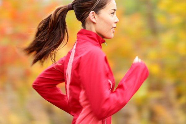 Woman running in fall