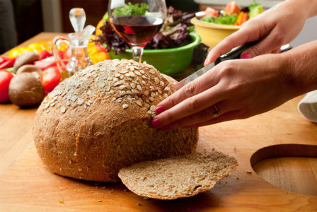 Woman slicing bread
