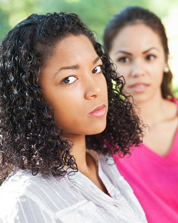 Woman with angry friend