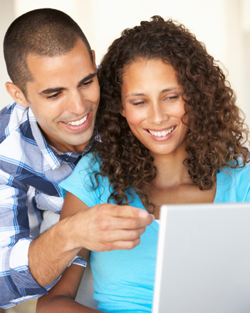 young couple on computer