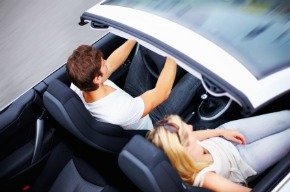 Couple in a convertible