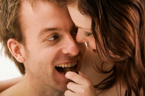 Couple eating chocolate