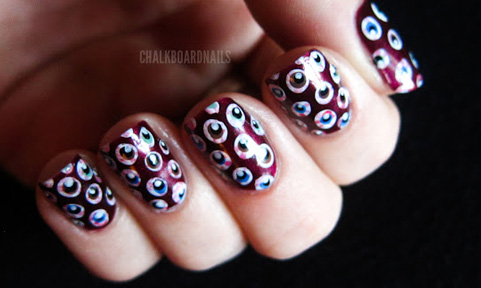 Graphic eyeball nail design