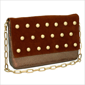 Whiting & Davis Studded Suede Bag, $225, whitinganddavisbags.com