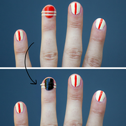 Painting the ring finger nail with black nail polish