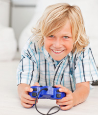 Kid playing video game