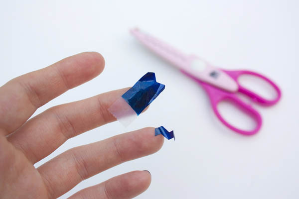 Cut the tape strips for Chevron nails
