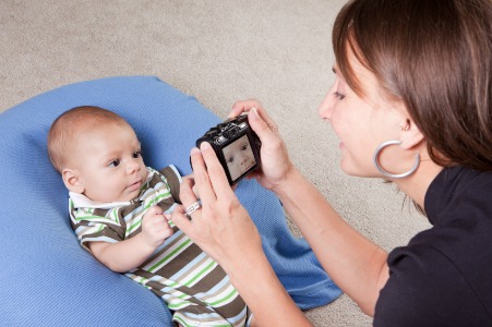 Mom taking Baby's picture