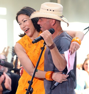 Ann Curry's happier times, with Kenny Chesney