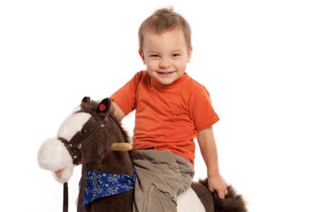 Child on rocking horse