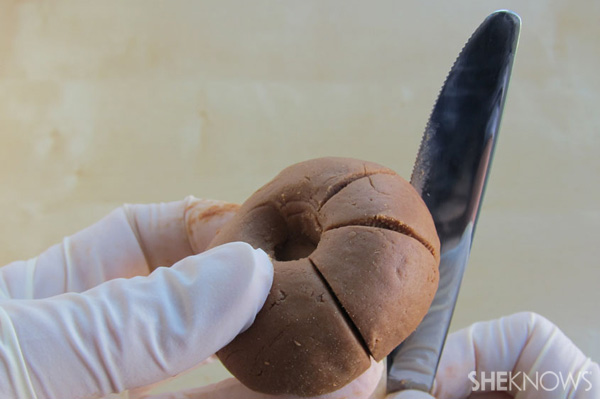 Turn chocolate balls into pumpkins