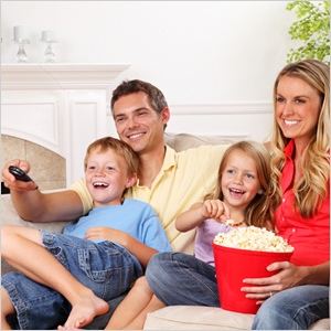 Family watching a movie