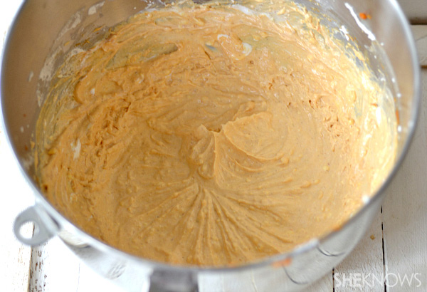 Mixed pumpkin cheesecake filling in mixing bowl