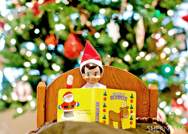 Elf on the Shelf idea 5: Elfie Rojo reading a book