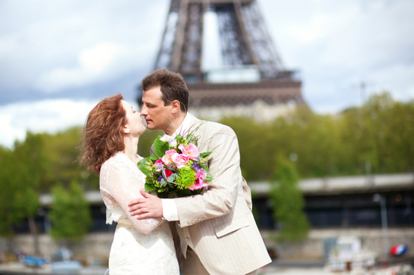 Just married couple kissing in Paris