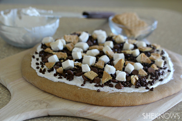 Add pizza ingredients