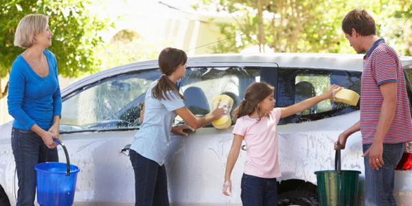 Family washing car