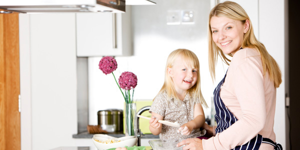 Mom and duaghter cooking