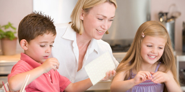 Mom and kids crafting