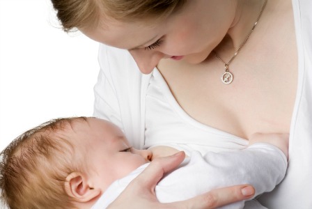 Woman breastfeeding baby