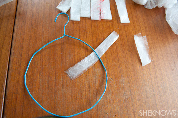 step-7-plastic-strips-onto-coathanger-wreath-watermarked.jpg