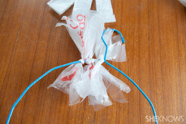 step-8-tie-plastic-bag-to-coat-hanger-watermarked.jpg