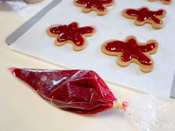Cherry-filled gingerbread man tarts -- add cherry filling