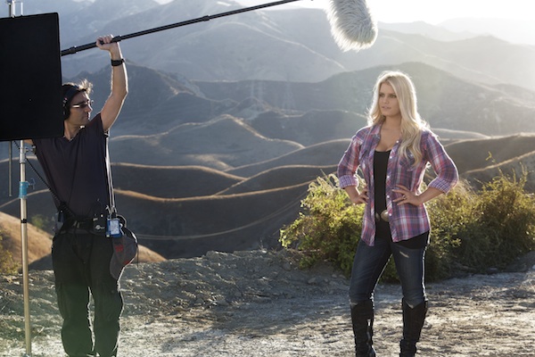 Jessica Simpson shows of 50 pound weight loss for Weight Watchers.